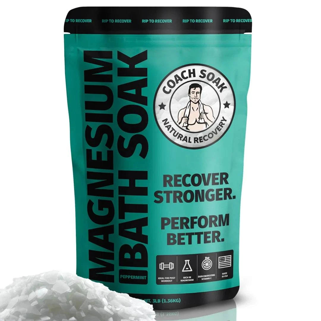 Coach Soak Magnesium Bath Soak relaxes the body and restores muscles with magnesium flakes, Dead Sea salt, and calming essential oils.